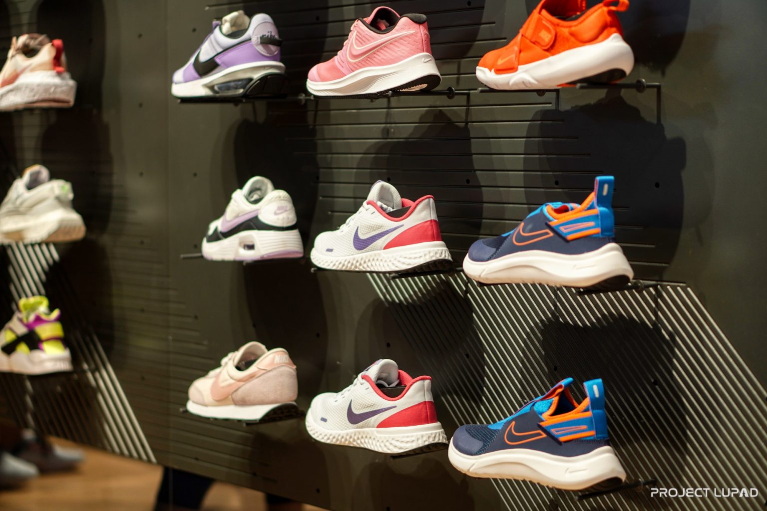 Nike sneakers on the shoe wall at Nike CDO